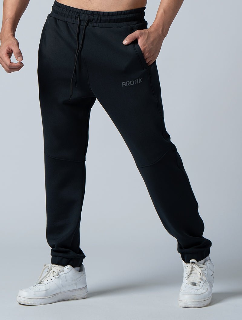 AirFlex™寬鬆剪接束口長褲 (黑) - AROAK 機能健身服飾 | 專為健人打造