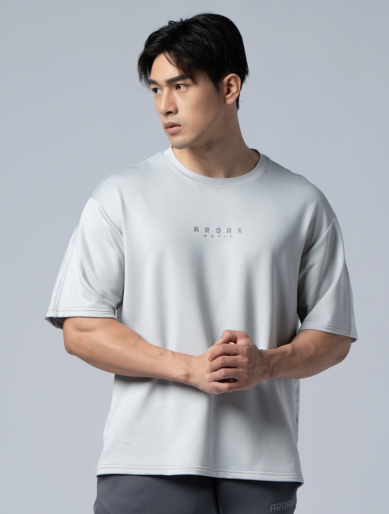 ONE - WAY™ 單向導濕後袖剪接訓練上衣 (淺灰) - AROAK 機能健身服飾 | 專為健人打造