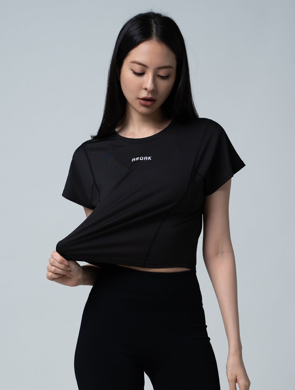 TuckAir™ 俐落拼接上衣 (黑) - AROAK 機能健身服飾 | 專為健人打造