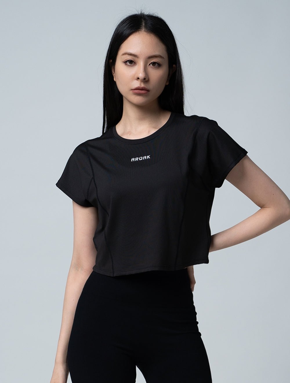 TuckAir™ 俐落拼接上衣 (黑) - AROAK 機能健身服飾 | 專為健人打造